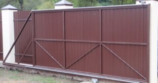 Купить откатные ворота из профнастила Губкин, цена от 1784 руб.