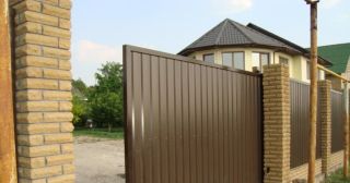 Купить откатные ворота из профнастила Губкин, цена от 1784 руб.
